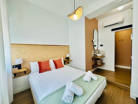 Bed, Photo of the whole room, Bedroom, towels, air conditioner