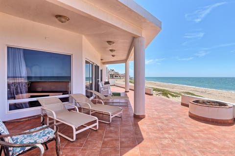 View (from property/room), Balcony/Terrace, Seating area, Beach, Sea view, sunbed