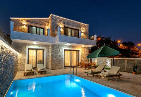 Property building, Patio, Night, Pool view, Swimming pool, sunbed