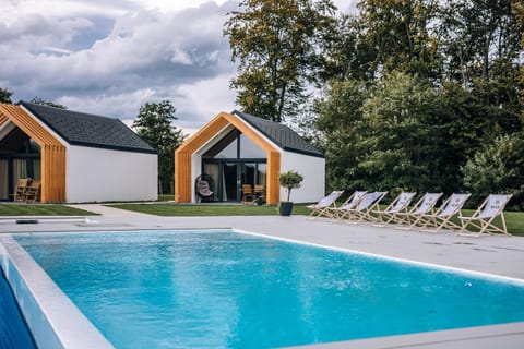 Property building, Pool view, Swimming pool, sunbed