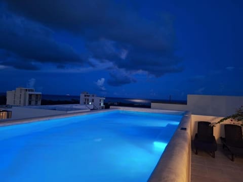 Night, View (from property/room), Swimming pool