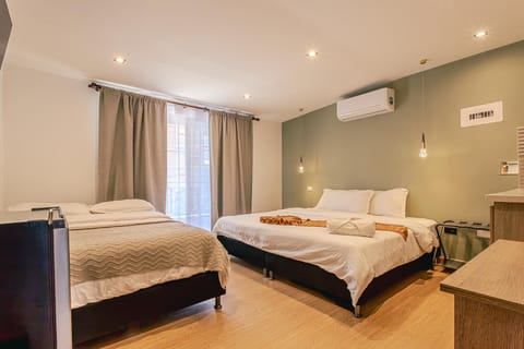 Bed, Photo of the whole room, Bedroom, towels, air conditioner
