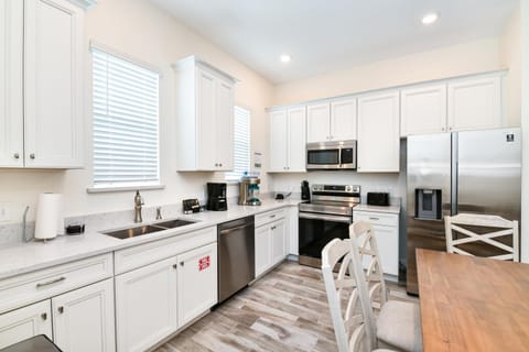 Dining area, dishwasher, microwave, oven, stove, toaster, kitchen