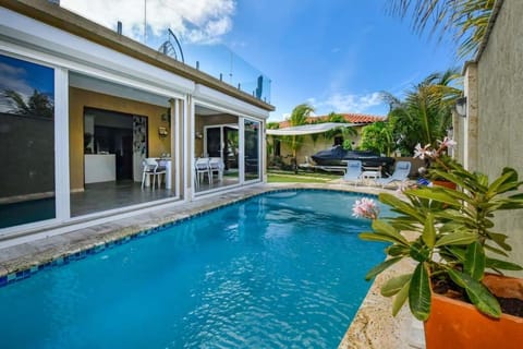 Property building, Day, Pool view, Swimming pool, sunbed