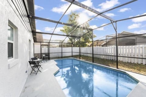 Retreat with Heated Pool in a Serene Community House in Kissimmee