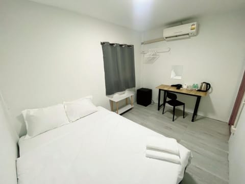 Bed, Photo of the whole room, Bedroom, hair dresser, towels, air conditioner