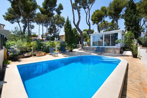 Property building, Living room, Swimming pool