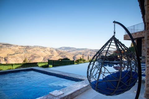 Patio, Day, Natural landscape, Mountain view, Pool view, Swimming pool, sunbed