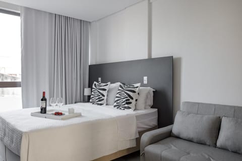 Bed, Living room, Seating area, Bedroom
