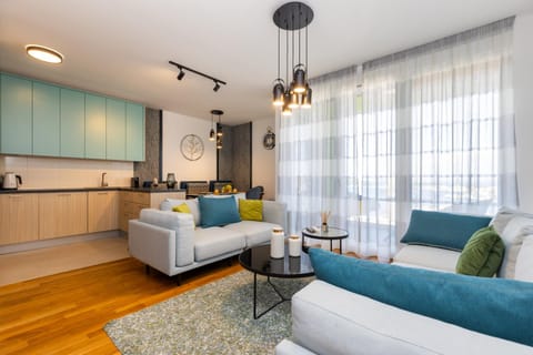 Kitchen or kitchenette, Living room, Seating area, Dining area