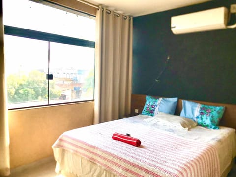Bed, towels, air conditioner