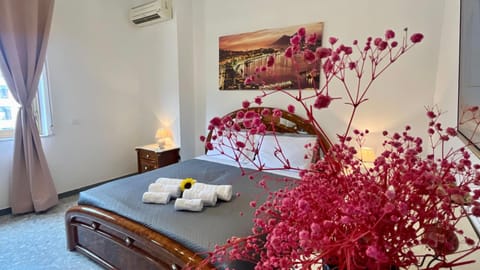Bed, Decorative detail, Bedroom, towels, air conditioner