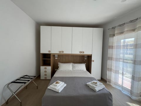 Bed, Photo of the whole room, Bedroom, towels, wardrobe