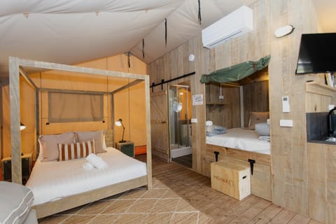 Bed, air conditioner