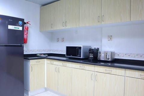 Kitchen or kitchenette, toaster