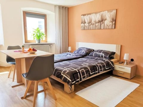 Bed, Seating area, Bedroom