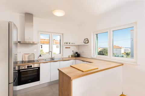 Kitchen or kitchenette, oven, stove