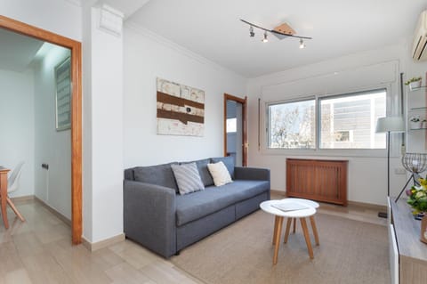 Property building, Living room, Seating area, air conditioner