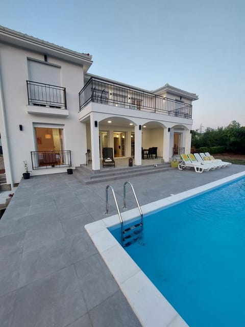 Property building, Pool view, Swimming pool, sunbed