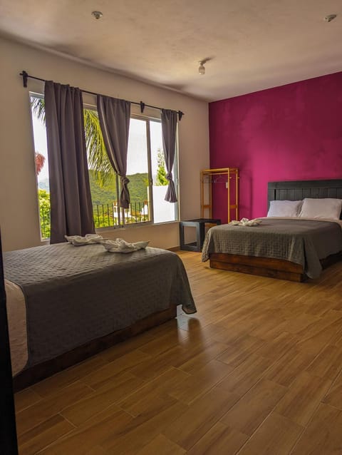 Céntrica habitación 2 camas queen - Gran Nehtolli #7 - Sin Estacionamiento Capsule hotel in Hidalgo, Mexico