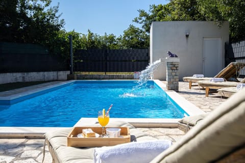 Swimming pool, sunbed