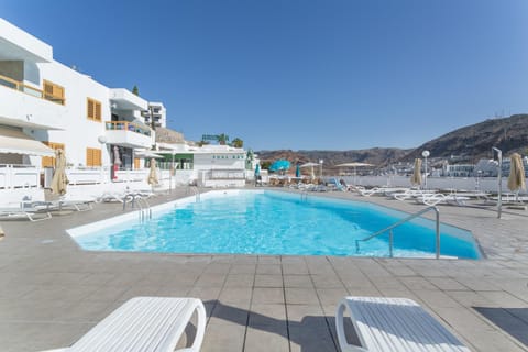Property building, Living room, Swimming pool