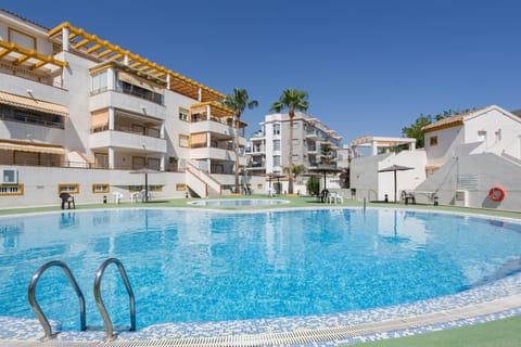 Property building, Living room, Swimming pool