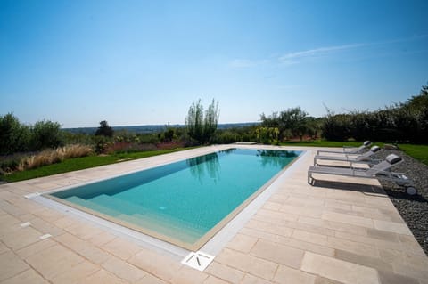 Property building, Natural landscape, Pool view, Swimming pool, Swimming pool, sunbed