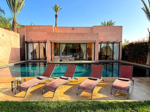 Property building, Day, Living room, Pool view, Swimming pool, sunbed