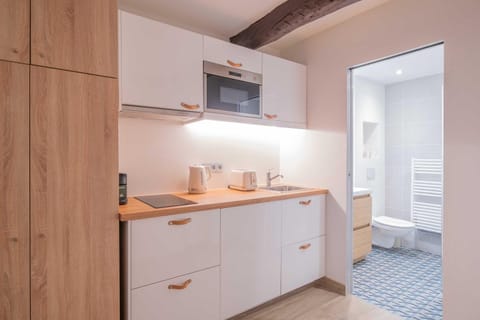 Kitchen or kitchenette, stove