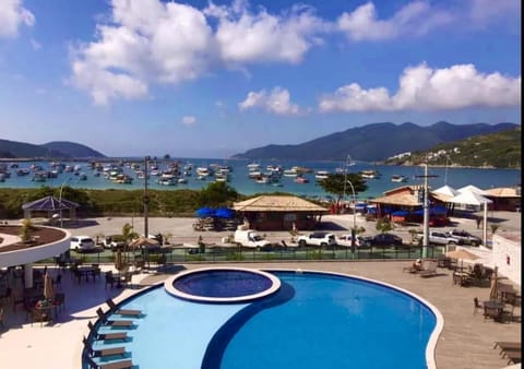 Apartamento frente ao Mar em Resort Pé na Areia Apartment in Vila Canaa