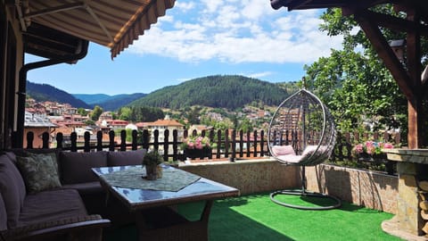 Property building, Natural landscape, View (from property/room), Seating area, City view, Garden view, Mountain view