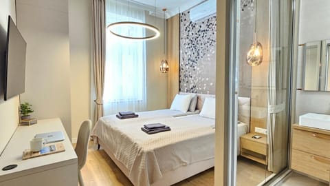 Bed, Bathroom, TV and multimedia, Bedroom, heating, towels, wardrobe, air conditioner