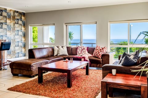 View (from property/room), Living room, Seating area, Sea view