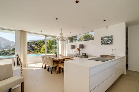 Kitchen or kitchenette, Dining area, Pool view