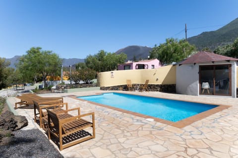 Property building, Living room, Swimming pool