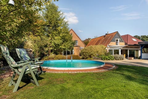 Property building, Living room, Swimming pool