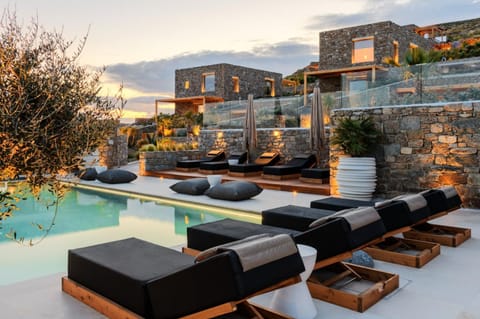 Property building, Patio, Natural landscape, Pool view, Swimming pool, sunbed