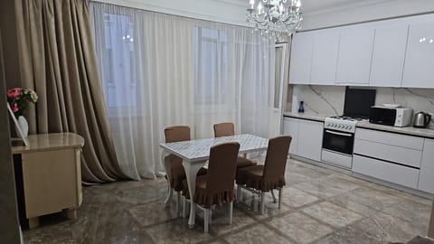 Kitchen or kitchenette, stove, toaster