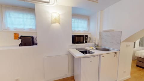 Kitchen or kitchenette, stove