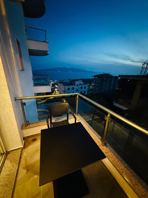 Patio, Night, Natural landscape, View (from property/room), Balcony/Terrace, Living room, Seating area, Dining area, Sea view