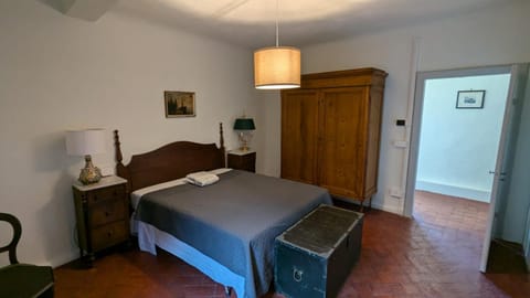 Bed, Photo of the whole room, Bedroom, flat iron, storage, towels, wardrobe