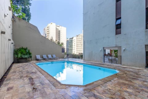 Property building, Pool view, Swimming pool, sunbed