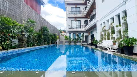 Property building, Patio, Day, Pool view, Swimming pool, sunbed