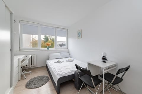 Bed, Living room, Seating area, Dining area