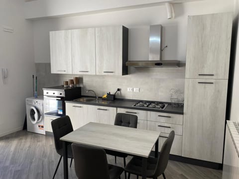 Dining area, dishwasher, stove, washing machine