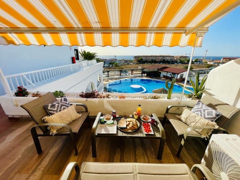 View (from property/room), Balcony/Terrace, Pool view, Swimming pool