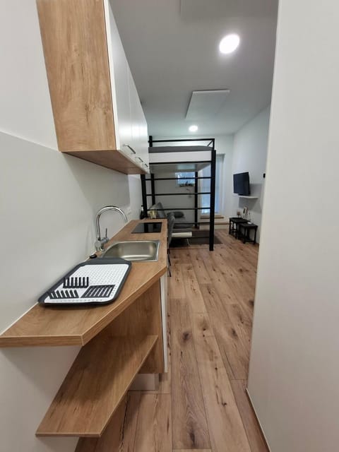 Kitchen or kitchenette, stove