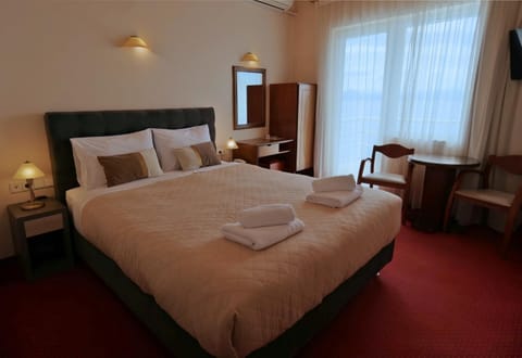 Bed, Sea view, towels