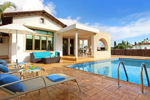 Property building, Patio, Pool view, Swimming pool, sunbed